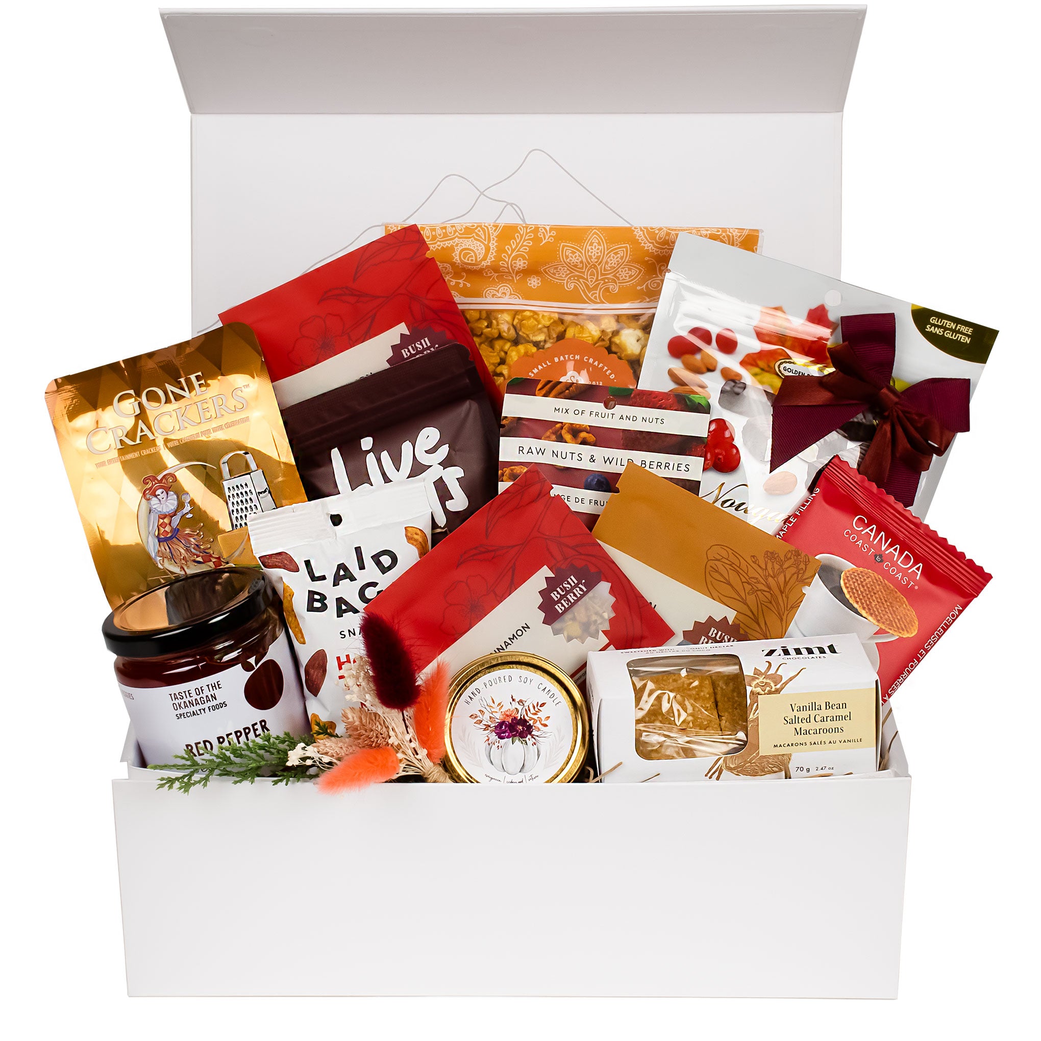 Assorted food items in a white box on a white background