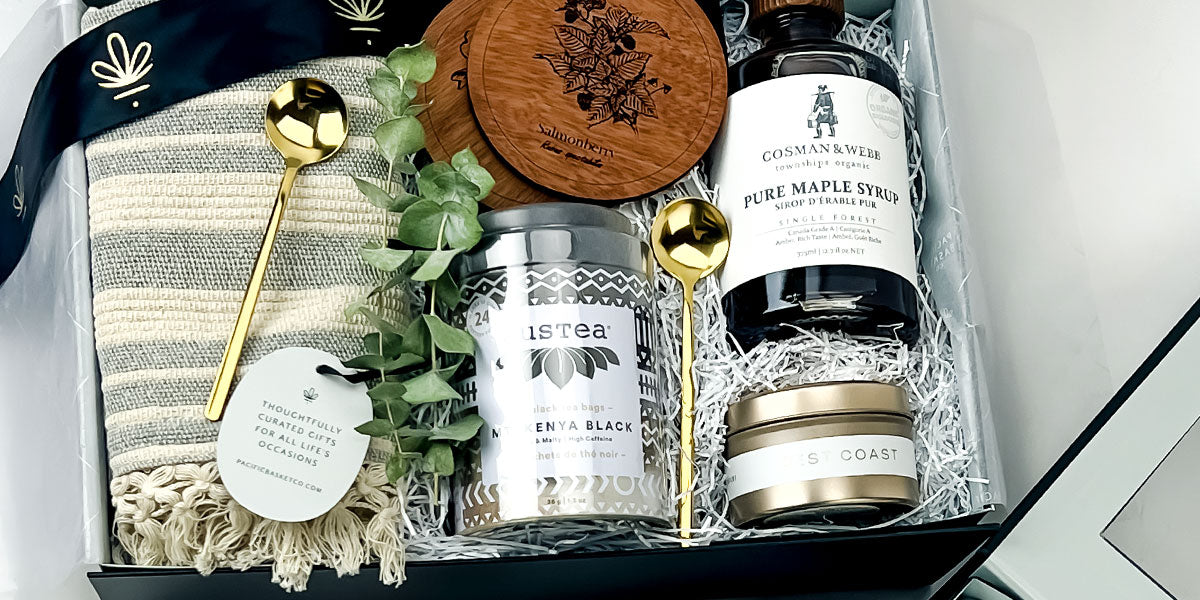Gift set with tea, maple syrup, and other items in a box