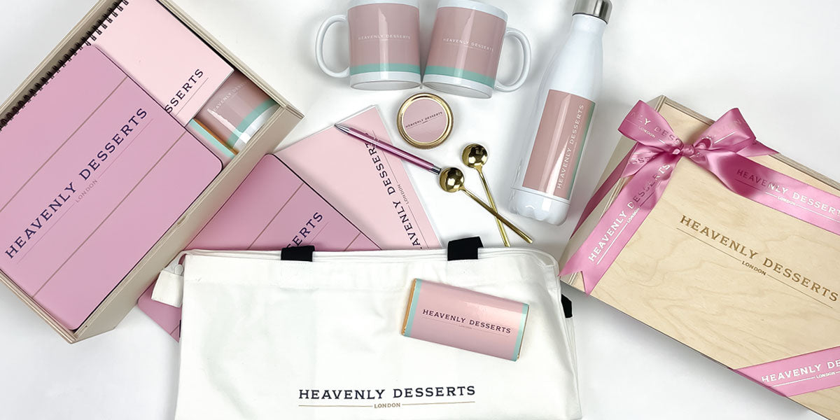 Pink and white 'Heavenly Desserts' product packaging on a white background