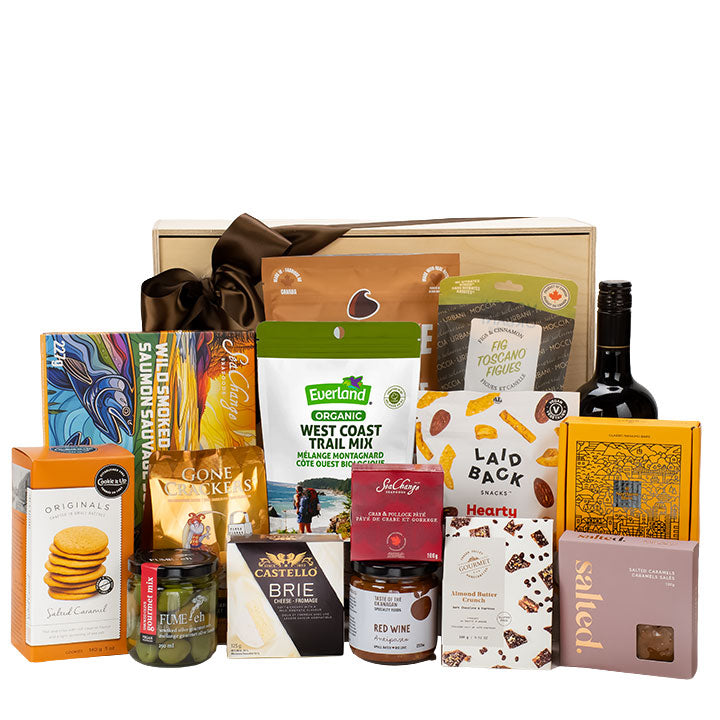Wooden gift box with assortment of snacks and gourmet foods for sharing