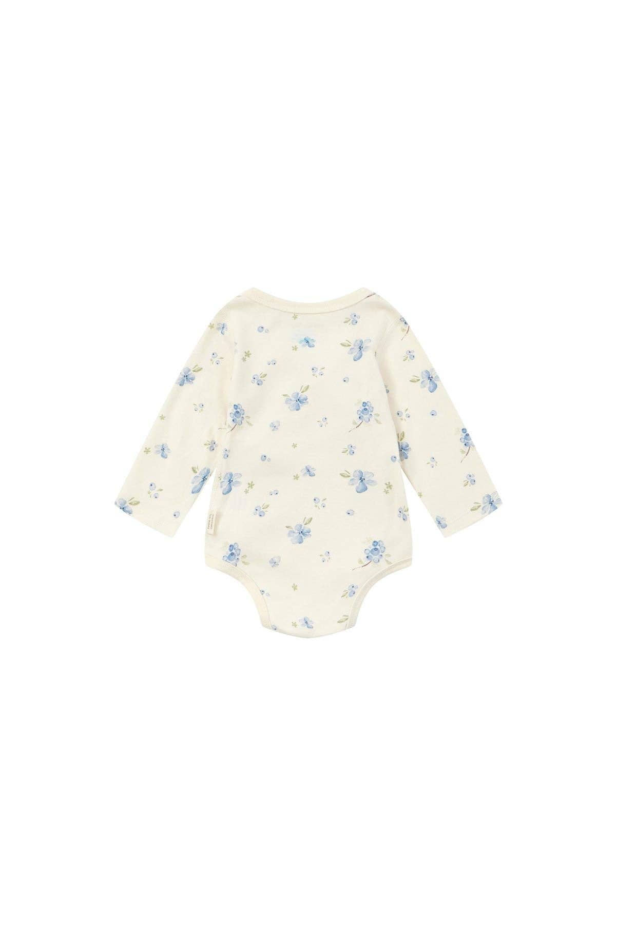 Baby romper with floral pattern on a white background