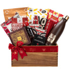 BC Ambassador welcome gift box featuring an Indigenous art water bottle, coasters, kitchen towel, and local snacks