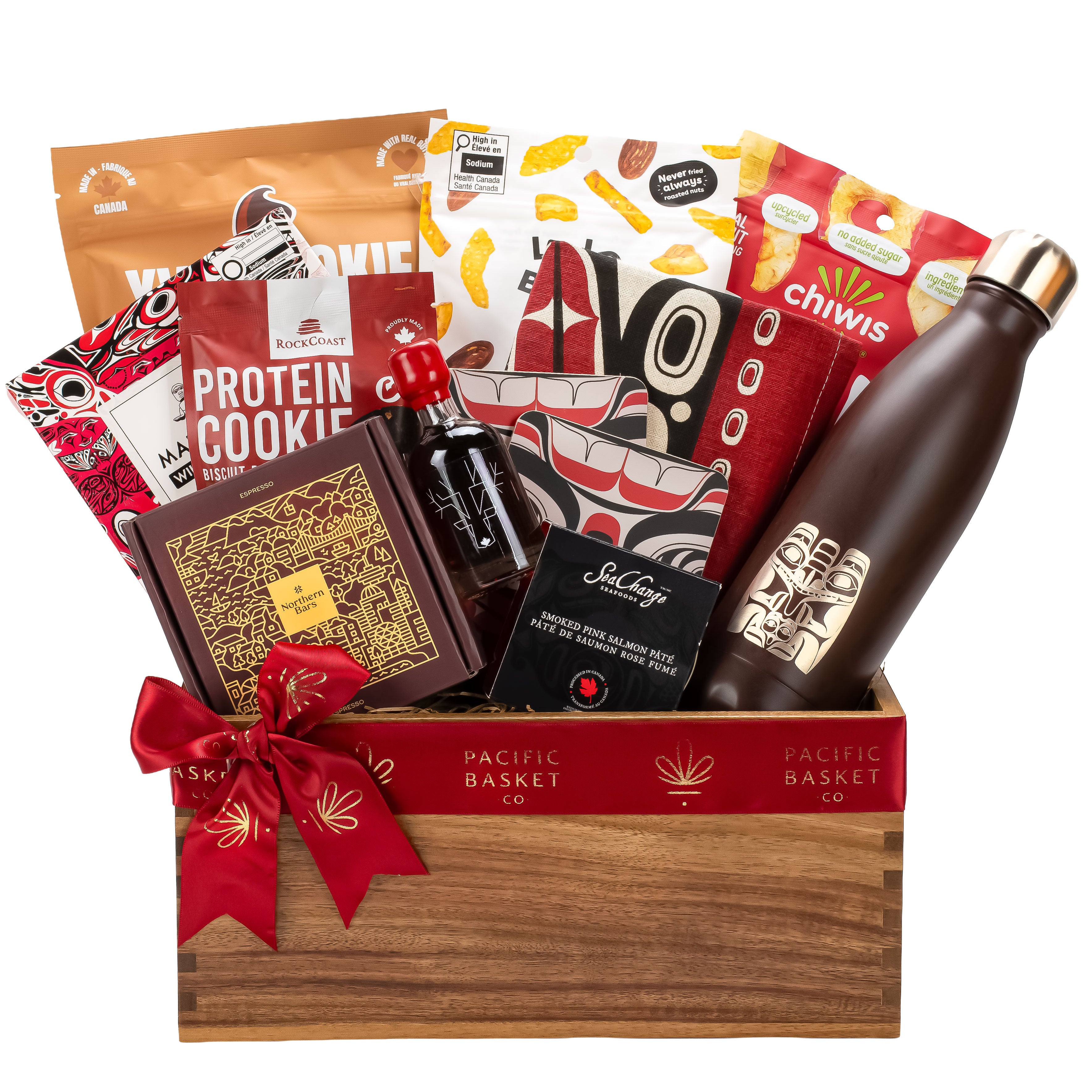 BC Ambassador welcome gift box featuring an Indigenous art water bottle, coasters, kitchen towel, and local snacks