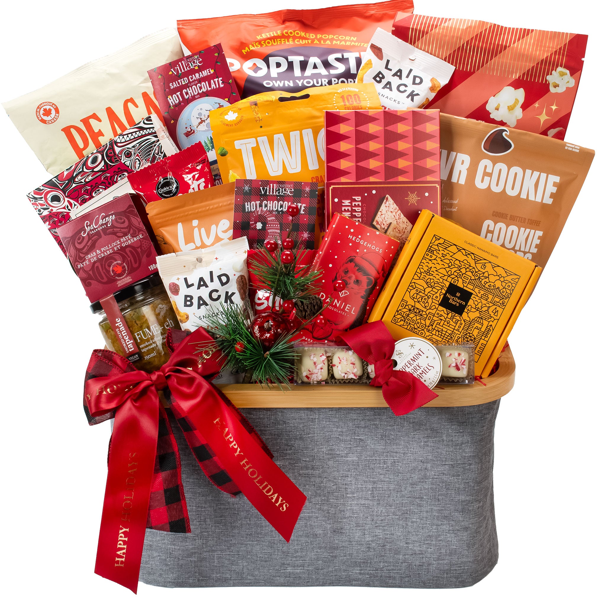 Gourmet gift basket with various snacks and treats on a white background
