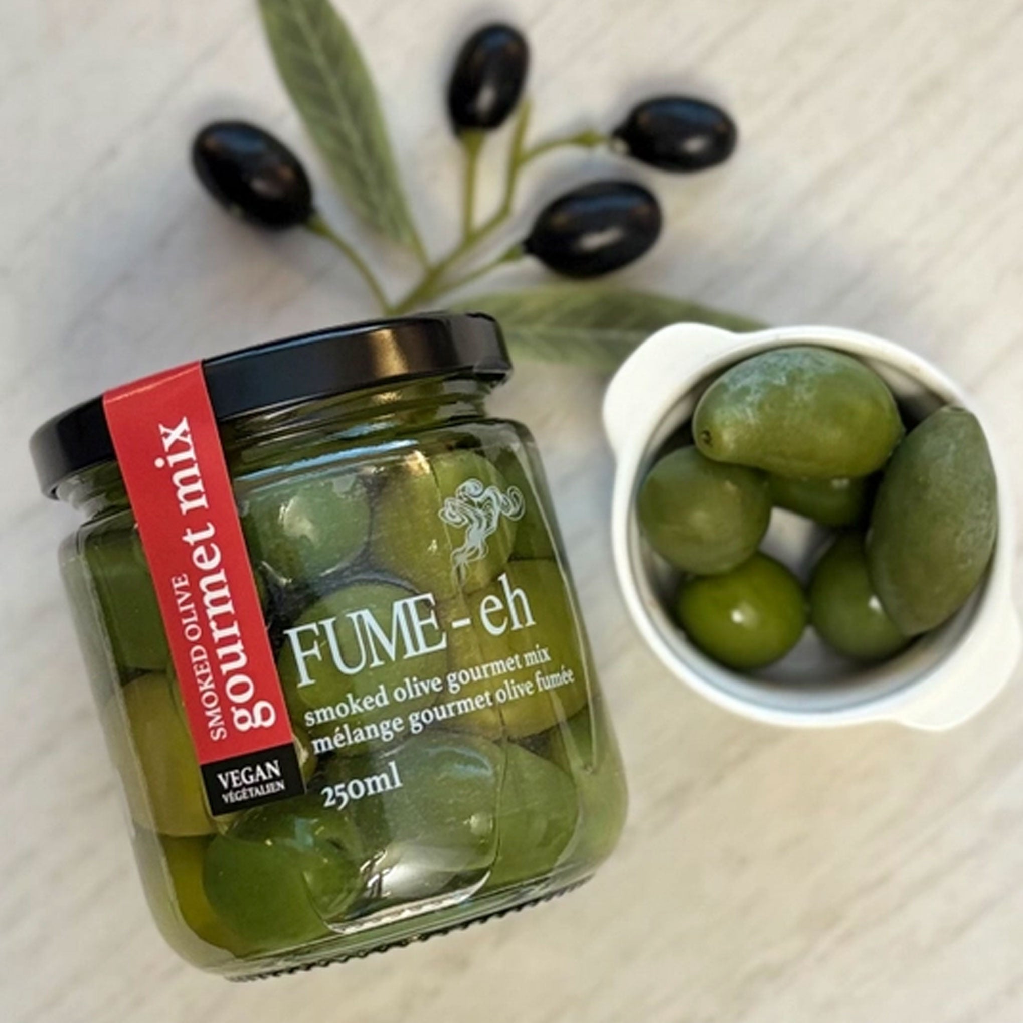 Jar of Fume-eh smoked olive gourmet mix made in BC - Vegan