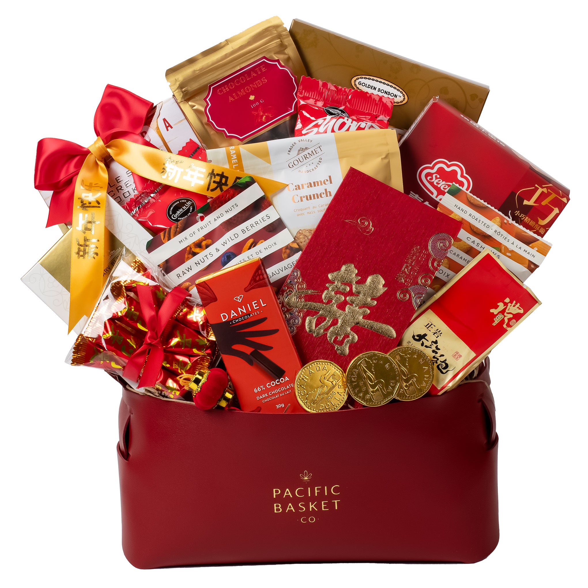 Gift basket with various items including chocolate bars and coins, branded 'Pacific Basket Co'.