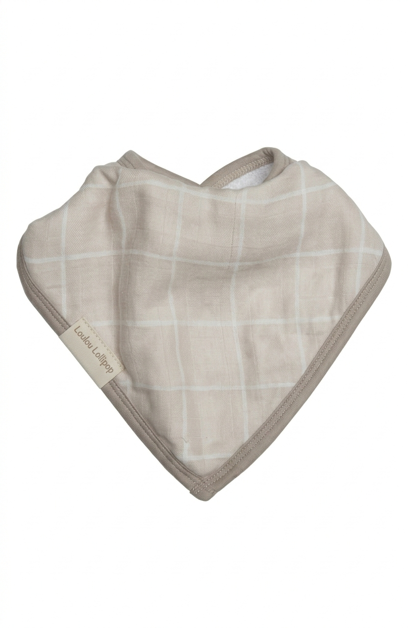 Baby bib with plaid pattern on a white background