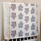 Canadian Indigenous baby blanket by Native Northwest. Showcasing design by Indigenous artist Yasakw (Shelly Samuels) . Shipping across Canada. 