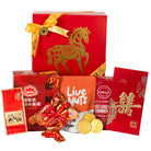 Assorted Chinese New Year gift set with red boxes and gold horse design, featuring snacks and candies.