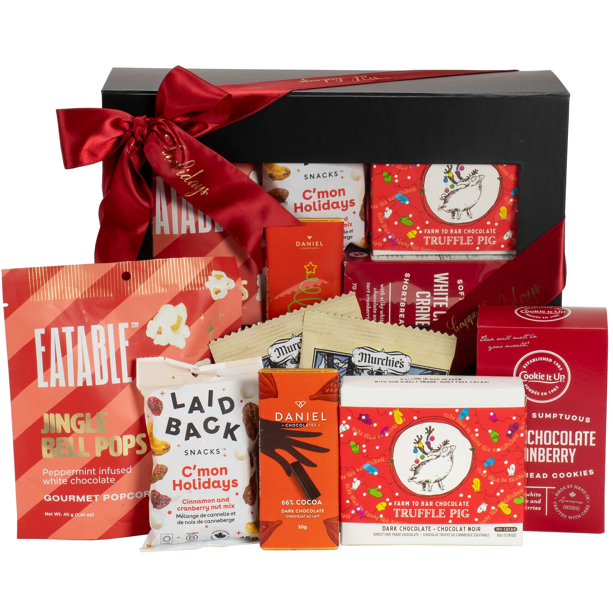 Assorted holiday-themed snacks in a gift box with a red ribbon - Vancouver Christmas gift baskets 